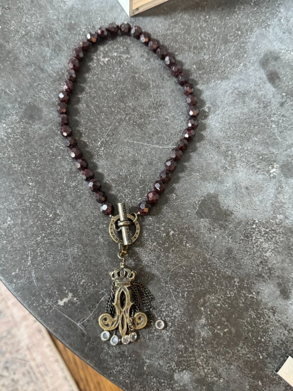 FRENCH KANDE Fleur De Lis Tassel Necklace Beaded Bronze Gold